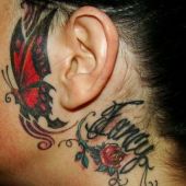 butterflys face woman tattoo
