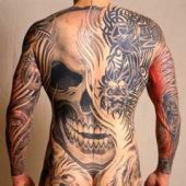 skull man full body tattoo
