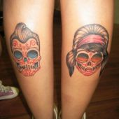 skulls leg tattoo