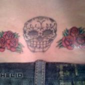 lower back tattoos skull and rose