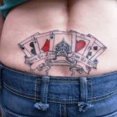 lower back tattoos play cards