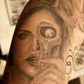 woman skull tattoo