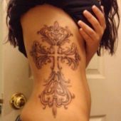 girl cross side tattoo