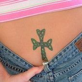 lower back tattoos celtic cross