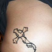 lower back tattoo rosary cross