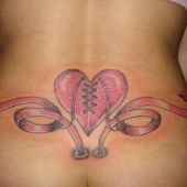 lower back tattoos heart ribbon
