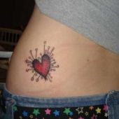 lower back tattoos heart voodoo