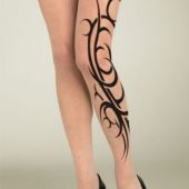 tribal woman leg tattoo