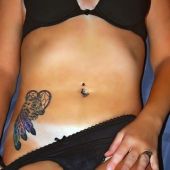 Dreamcatcher stomach tattoo