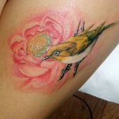 thigh bird tattoo