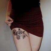 thigh tattoo rose