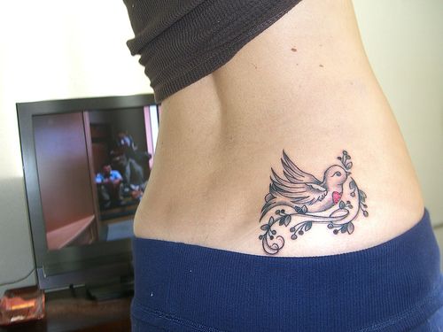 sparrow  lower back tattoo for girl