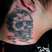 skull neck tattoo