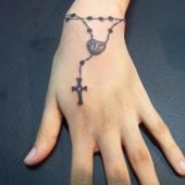 rosary hand tattoo