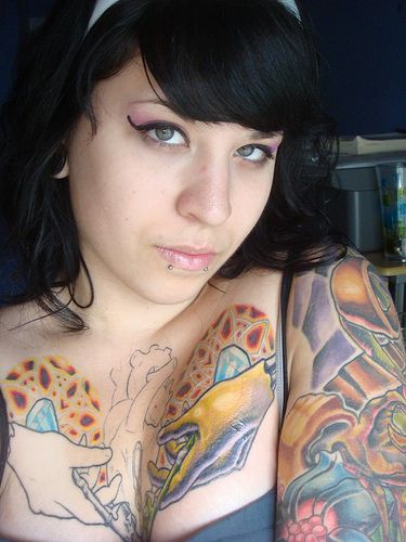 woman chest tattoo