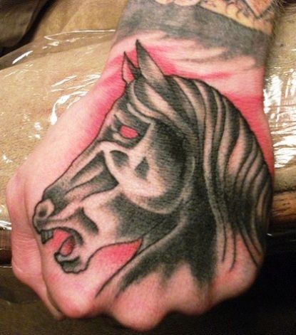 horse hand tattoo