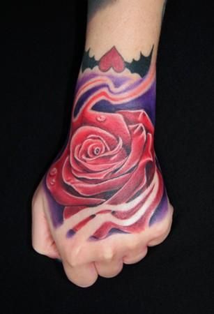 rose hand tattoo