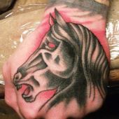 horse hand tattoo