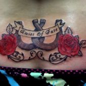 lower back tattoo horseshoe rose